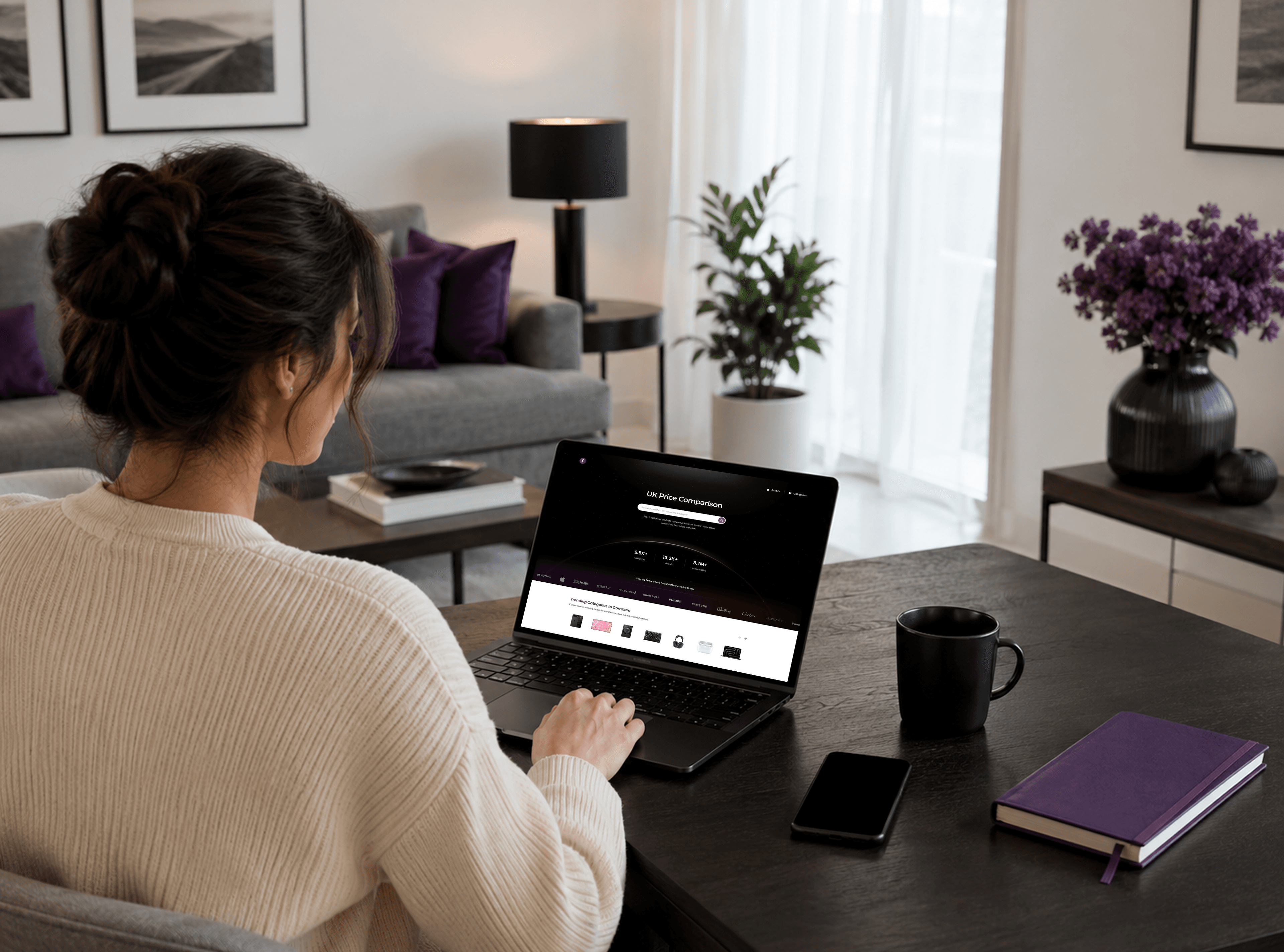Woman comparing prices on UK Price Comparison Website
