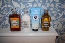 Image of L'OCCITANE 4 PIECE SET, ALMOND SHOWER-OIL + MILK VEIL, SHEA SCRUB, LUMINCIANA,