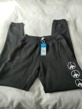 Image of Unisex Adidas Joggers New With Tags Size XS Colour Black With Zips Pockets