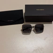 Image of Dolce and Gabanna DG2279 gold frame light gradient black lense sunglasses
