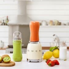 Image of Smeg 50’s Retro Mini Blender 600ml Bottles-To-Go, 2 Speeds, Cream Finish