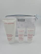 Image of CLARINS Gift Set - BODY LOTION, BODY SCRUB, HAND CREAM, WASH BAG.