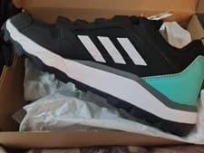 Image of Adidas Original Woman trainer  Colour Is Black and teal New In Box  