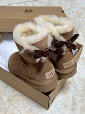 Image of New UGG brand Women's Mini Bailey Bow II Chestnut Soft Ankle Boots