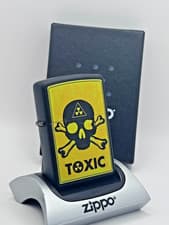 Image of GENUINE Zippo VIBRANT YELLOW TOXIC SKULL DESIGN Black Matt NEW FAST POST