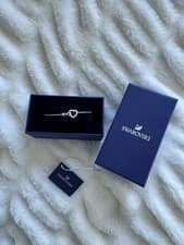 Image of Swarovski Infinity Heart Bracelet Rhodium Plated Bracelet new with box.