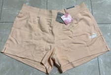 Image of Puma XL Essentials Sweat Shorts Peach/White Women’s Logo Pockets Side Slit