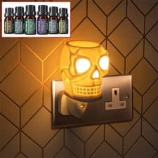 Image of Electric Skull Oil Burner & Wax Warmer Plug-in Aroma Diffuser + 6 Essential Oils
