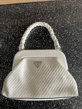 Image of guess sicilia braided clutch