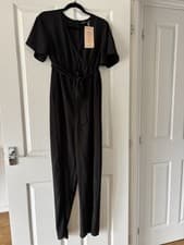 Image of New ONLY Maternity wrap-style jumpsuit with short sleeves and a tie waist size M