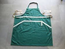 Image of Le Creuset Chef's Bibbed Apron Dark Green with Four Pockets 100% Cotton Canvas