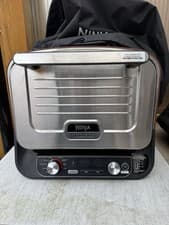 Image of Ninja Woodfire Electric Outdoor Oven Artisan Pizza Maker and BBQ Smoker OO101UK