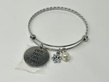 Image of Animal Liberation Silver Bangle Bracelet UNTIL EVERY CAGE IS EMPTY Paw Charm