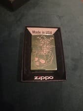 Image of Perfect Boxed Green High Polished Chrome Etched Botanical Skull Zippo Lighter UK