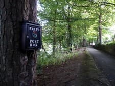 Image of Photo 6x4 Fairy Post Box, Donegal Donegal/G9278 Pictured along the Bank c2017