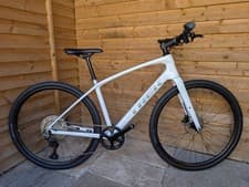 Image of *BRAND NEW* Medium TREK FX 4 FX4 Carbon Fibre Hybrid bike VIEW SWANSEA/BRIDGEND