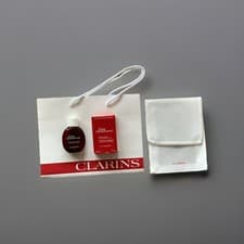Image of Clarins Eau Dynamisante Treatment Fragrance 30ml boxed with gift bag and pouch