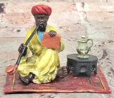 Image of After Bergman, Vienna Bronze Arab Man Smoking Pipe Sitting on Carpet