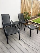 Image of Brooke 5 piece black garden bistro set with foot stools
