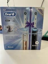 Image of Oral-B Genius 9900 Twin Pack Electric Rechargeable Toothbrush Black, Rose Gold