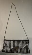 Image of guess handbag black and gold