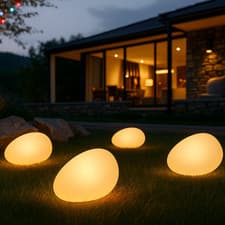 Image of LED Solar Glowing Stones (4 Pack), Solar powered, Weather-resistant, Outdoor use