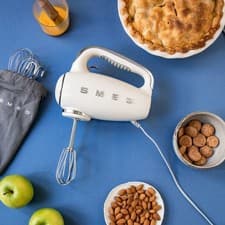 Image of Smeg Hand Mixer 50’s Style Cream Electric Hand Mixer with Accessories  HMF01CRUK