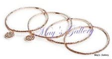 Image of GUESS Jeans Rhinestones Bangle Bracelet Rose Gold Tone Charms Pave Logo Set of 4