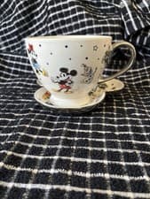 Image of DISNEY 100 YEARS OF DISNEY LARGE TEA CUP MUG AND MICKEY SHAPED SAUCER