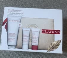 Image of Clarins Body Care Essentials Body Lotion, Scrub Hand Nail Cream Boxed Gift Set