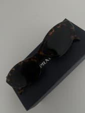 Image of prada sunglasses PRADA PR 26ZS 14L09Z 55