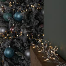 Image of 9.3m 720 LED Christmas Cluster Lights with Timer in Warm White on Clear Cable