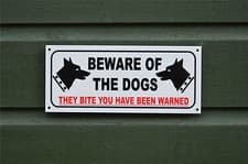 Image of BEWARE OF THE DOGS THEY BITE YOU HAVE BEEN WARNED sign or sticker 2 sizes guard