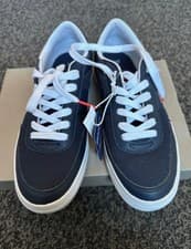 Image of Boys brand new Lacoste Trainers. Junior size 2.5. Navy blue in colour