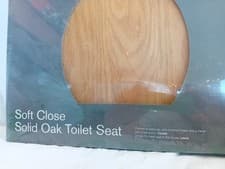 Image of Cooke and Lewis Solid Oak Soft Close Toilet Seat. New