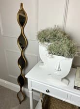 Image of Gold teardrop statement mirror