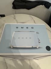 Image of SMEG TSF03BLUK Retro Black 4 Slice Toaster