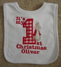 Image of Personalised applique Peter Rabbit 1st christmas bib pink blue white red name