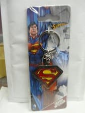 Image of Superman keychain. Metal and enamel. Original card. New. S logo design