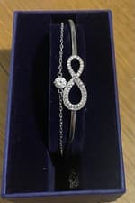 Image of Swarovsky Infinity Crystal Bangle Silver Tone