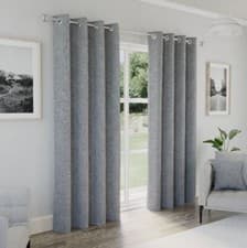 Image of Austin Textured Plain Eyelet Header Readymade Blackout Curtains - 6 Colours