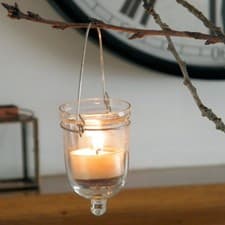 Image of Nkuku 'firefly' handing lantern tealight holder fairtrade clear recycled glass