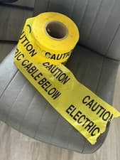 Image of Yellow "Caution Electric Cable Below" Non Adhesive Tape 150mm x 365m