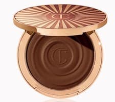 Image of CHARLOTTE TILBURY BEAUTIFUL SKIN SUN-KISSED GLOW BRONZER 4 Deep/ Fonce