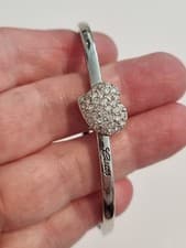 Image of Guess Signed Sparkling Logo Heart Bracelet Black Cord Adjustable Silver tone