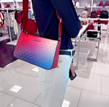 Image of Michael Kors Jet Set Travel S Crossbody Tech 3in1 Bag Dark Raspberry color shift