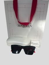 Image of Alexander McQueen cat eye sunglasses AM0299S In Black And Red
