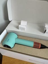 Image of Dyson Supersonic Nural™ Hair Dryer - Ceramic Patina and Topaz. RRP £399.99.