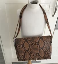 Image of BNIP RAELYNN RING DETAIL CROSS BODY ANIMAL PRINT BAG