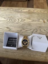 Image of guess mens equity collection watch, gold stainless steel, 43mm 46mm,in water 50m
